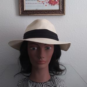 "Exclusive of Decoration" brimmed straw hat